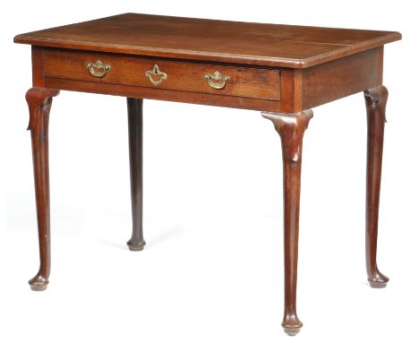 A George II mahogany chamber table, the rectangular top with a full caddy moulded edge, above a divided frieze drawer with a 