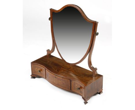 A late Victorian mahogany and marquetry dressing table mirror, the bevelled shield shape plate above a serpentine box base in