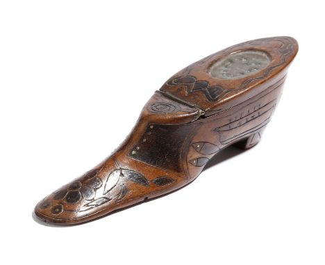 A 19th century treen sailor's valentine snuff shoe, with brass tack inlay, the hinged lid with an inset pewter panel decorate