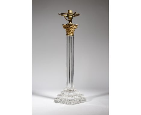 A late 19th century cut-glass and gilt brass Corinthian column table lamp, with a faceted stem and a stepped base, 69.7cm hig