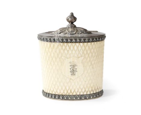 λ A Victorian silver plated and ivory tea caddy, with egg and dart mounts, the hinged lid above a lattice carved body, with a