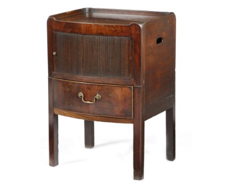 A George III mahogany tray-top bedside commode, with a tambour shutter, the converted base with a drawer, the sides pierced w