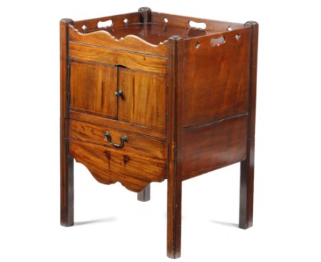 A George III mahogany tray-top bedside commode, inlaid with later stringing, the gallery pierced with diamonds and three hand