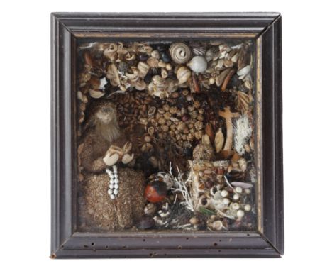 A George III seashell and seed diorama, with a bearded sailor seated in a grotto reading a book before a skull and a cross, i