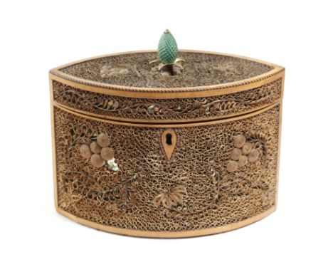 λ A George III rolled paper tea caddy, of navette shape, inlaid with barber's pole stringing and decorated with scrolling lea