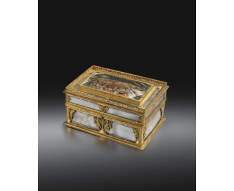 A French Restoration Palais-Royal ormolu and engraved mother of pearl nιcessaire, decorated with cherubs, flowers and masks, 