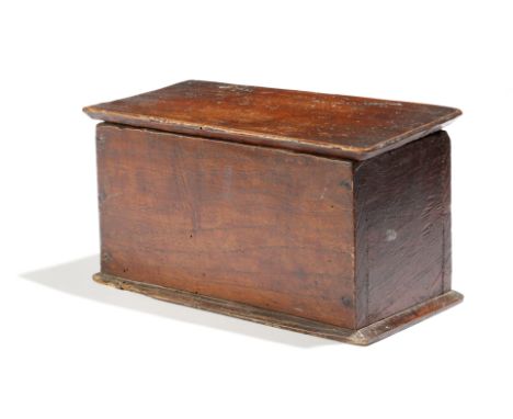 A 17th century elm lace bobbin box, the hinged lid decorated with an incised whorl rondel, with wire hinges, containing a num