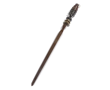 A George III sharpening steel, with a turned ebony handle and an engine turned ferrule, the faceted steel engraved with two c