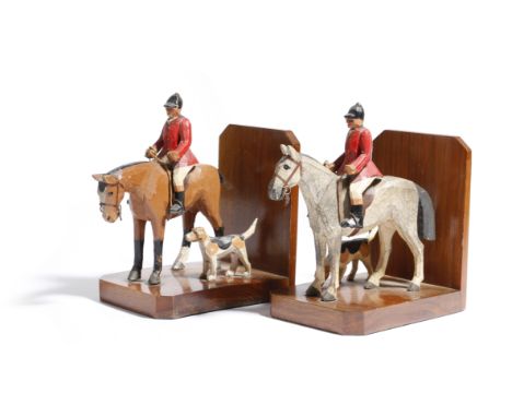 A pair of early 20th century carved wood and painted hunting bookends attributed to Frank Whittington, of Forest toys, each m