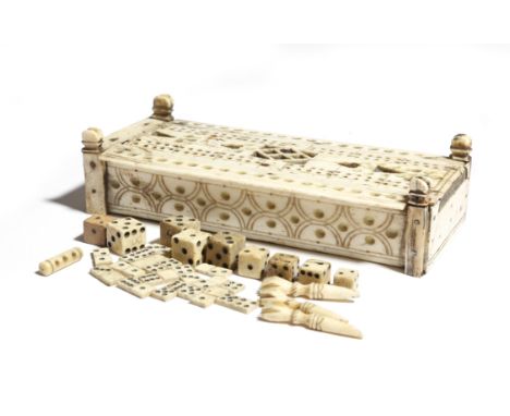 An early 19th century French Napoleonic bone prisoner of war games box, with traces of polychrome decoration, the sliding lid