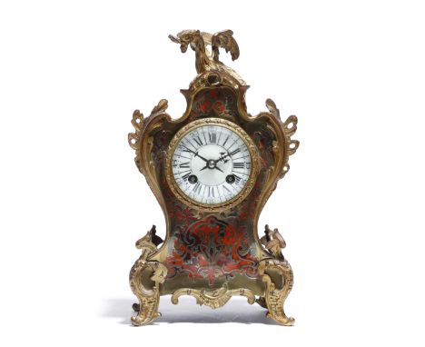 λ A late 19th century French boulle marquetry mantel clock in Louis XV style, the eight day brass drum movement striking on a