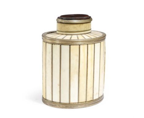 λ A 19th century ivory oval tea caddy / canister, with engraved brass mounts and a brass lined interior, with a rosewood lid,