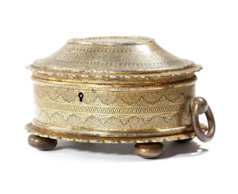 A mid-19th century Anglo-Indian iron and koftgari oval box, with gilt damascened decoration of bands of scrolling leaves and 