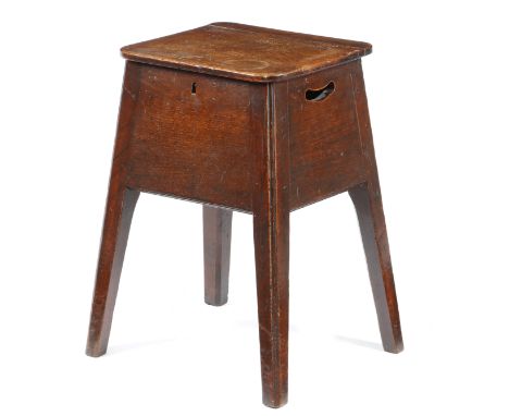 A George III elm box stool, the hinged seat above a handgrip pierced to each side, on moulded and chamfered legs, 49.4cm high