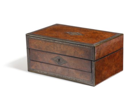 λ A Victorian burr walnut dressing case, with brass and white metal stringing and edging, the hinged lid inset with a gilt to