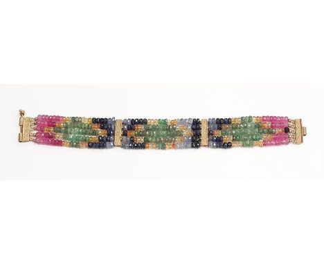 Natural sapphire ruby &amp; emerald bracelet on gold metal mounts. 7.5". Tests as silver gilt. 