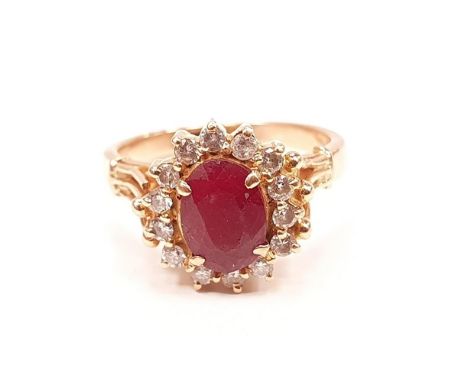 Ruby and Diamond set in tested 18ct gold ring.