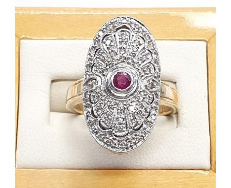 14ct gold ladies diamond and ruby ring. Size N. 
