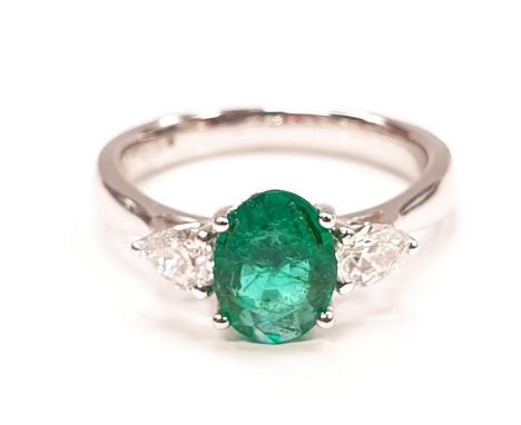 18ct white gold three stone emerald and diamond ring with trillion cut diamond shoulders 1.25cts. Size M. 