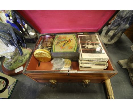 Vintage box containing vintage postcards, assorted coinage and tea cards