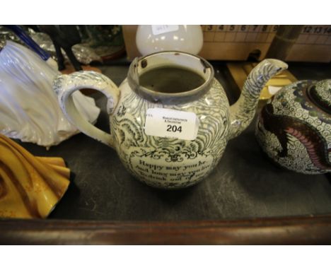 18th Century pottery 'Motto' teapot (lacking cover)