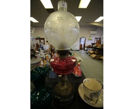 Victorian oil lamp with ruby glass reservoir and etched shade