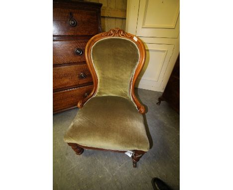 Victorian walnut spoon back nursing chair
