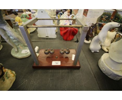Vintage 'Perpetual Motion' desk ornament (a.f.)