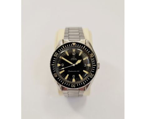 A gent's Omega Seamaster 300, Ref 165.024, black dial having hourly baton markers, stainless steel bracelet strap wrist watch