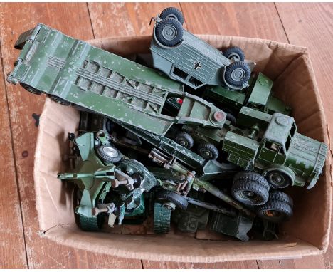 A collection of Dinky and Corgi military vehicles unboxed.