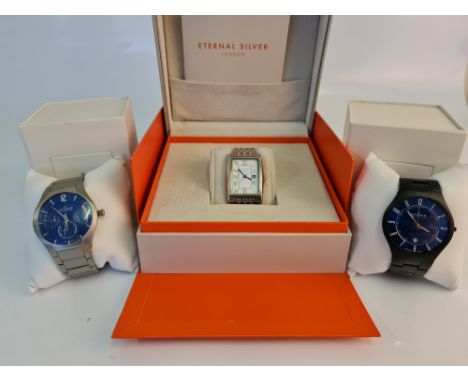 A Gent's Eternal Silver wristwatch, with hourly Roman numeral marker's date aperture to 3 0 'clock, on bracelet strap, with s