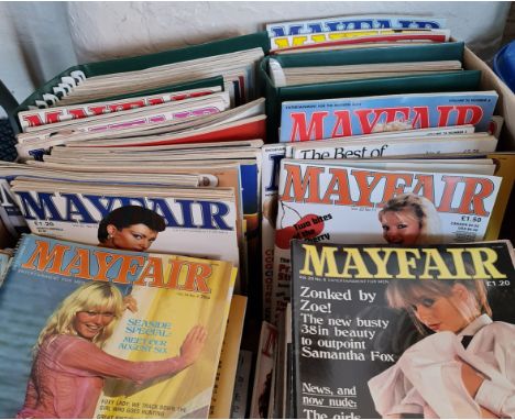 A collection of Mayfair magazines from the 80s to early 90s.