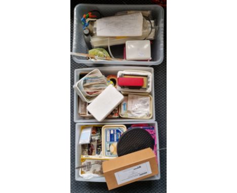 Three boxes of mixed railway model train parts and accessories.