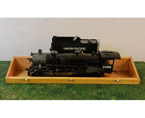 An Aster Hobby live steam USRA Light Mikado 2480 gauge 1 model train and tender with wooden travel box and assembly and opera