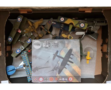 Two boxes of model aircraft planes.