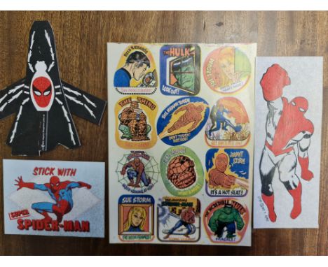 A sheet of comic book stickers - various characters and three Spiderman stickers. Additional info Spider Man T shirt transfer