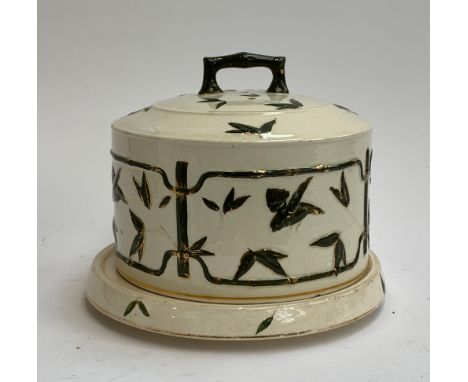 A 19th century bamboo design large ceramic cheese cloche, with staple repairs, 25.5cmD 