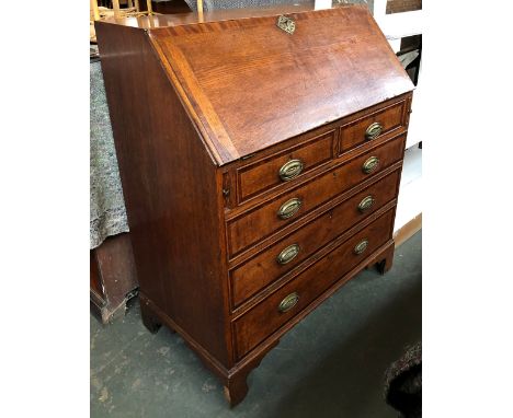 An oak bureau, two short over three long crossbanded drawers, on bracket feet, 91x49x108cmH 