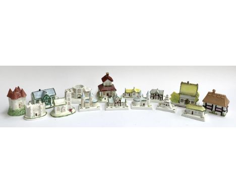 A lot of fifteen small Coalport ceramic cottages to include Summer Retreat, Rustic Cottage, Tudor Cottage, Village Cricket Pa