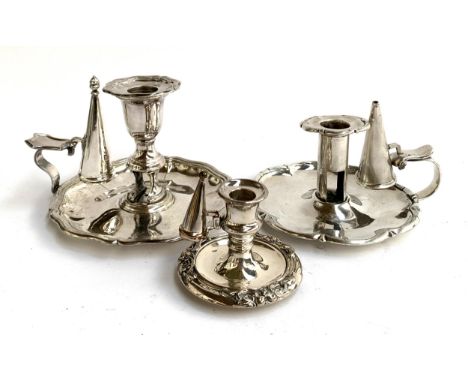 Three plated candlestick holders with snuffers 