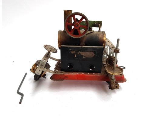 A Mamod steam engine model believed to be M.M.2  Minor No.2, with vapourising spirit lamp, mounted to a red metal baseplate t