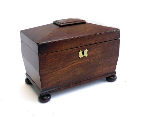 A small George III mahogany sarcophagus tea caddy, on bun feet, 19cmW 