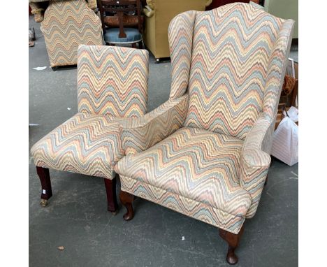 A wingback armchair, on cabriole legs, 80cmW; together with an upholstered chair in matching print 