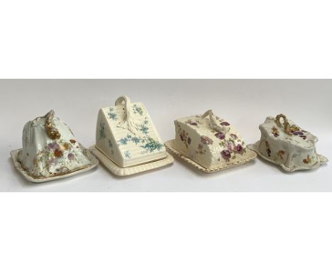 A lot of four ceramic cheese cloches, two with Greek dolphin handle, one Staffordshire 