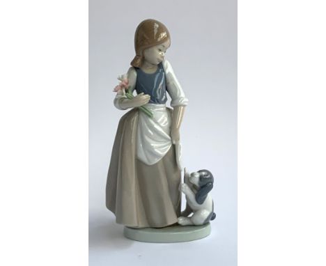 A Nao figure of girl with dog, 23cmH 
