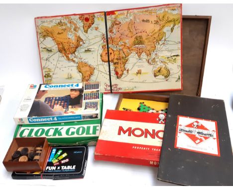 A mixed lot of games to include monopoly, connect 4, clock golf, hexagonal Chinese checkers board etc 
