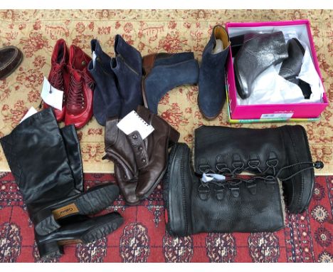 A pair of Gabor size 4.5 black ladies boots; a pair of ladies hush puppies size 5; a pair of blue suede boots; a pair of Dako