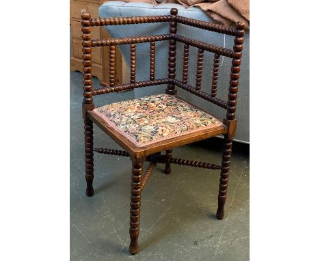 A bobbin turned corner turners chair 