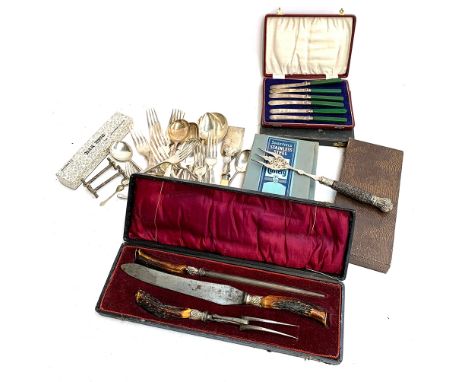 A quantity of plated flatware; number of cased plated sets, to include butter knives (two sets of six); two sets of stainless