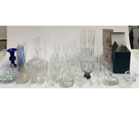 A large quantity of glass and cut glass items to include Caithness, wine glasses, brandy balloons, trinket pots, champagne fl